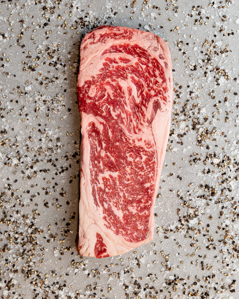 MB 6-7 NY STEAK - 12OZ